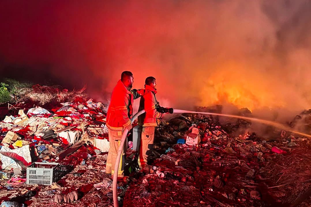 MNDF Fire and Rescue Service personnel battle a fire at the WAMCO waste disposal site in Addu City’s Meedhoo. | Photo: MNDF