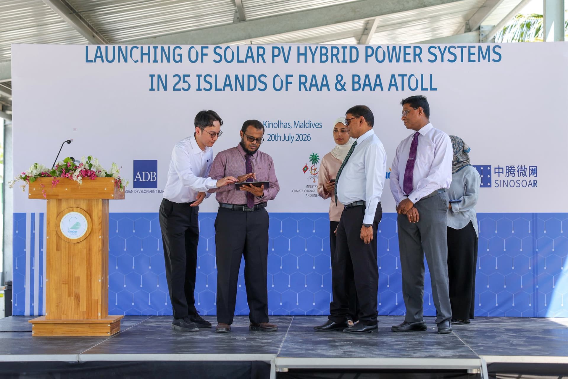 Minister of Climate Change, Environment and Energy Ali Shareef officially launches the Solar PV Hybrid Power Systems Project in R. Kinolhas on Sunday. | Photo: Ministry  of Climate Change, Environment and Energy